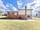 Side view of the house, showcasing the brick and siding at 2223 Chatham St, Newton, NC 28658