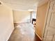 Unfinished basement with concrete floors and a pet crate at 2223 Chatham St, Newton, NC 28658