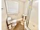 Basement bathroom with shower, toilet and pedestal sink at 2223 Chatham St, Newton, NC 28658