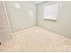 Simple bedroom with neutral walls and carpet flooring at 2223 Chatham St, Newton, NC 28658