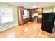 Updated kitchen with wood cabinets and hardwood floors at 2223 Chatham St, Newton, NC 28658