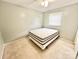 Simple bedroom with neutral walls and carpet flooring at 2223 Chatham St, Newton, NC 28658