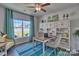 Home office with built-in shelving and large window at 132 Balboa St, Matthews, NC 28104