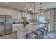 Spacious kitchen with large island, stainless steel appliances, and granite countertops at 132 Balboa St, Matthews, NC 28104