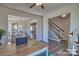 Open living area with hardwood floors and access to dining area at 132 Balboa St, Matthews, NC 28104