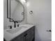 Modern bathroom with gray vanity, quartz countertop, and black matte fixtures at 442 Stoneycreek Ln, Rock Hill, SC 29730