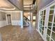 Bright and spacious entryway with tile floors and a staircase at 3007 Gambrill Falls Dr, Indian Trail, NC 28079