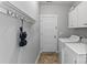 Laundry room with washer, dryer, and storage cabinets at 3157 Delaware Dr, Denver, NC 28037
