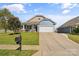 Ranch style home with gray and beige siding and attached garage at 3157 Delaware Dr, Denver, NC 28037