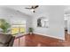 Bright living room with hardwood floors and view into kitchen at 3157 Delaware Dr, Denver, NC 28037