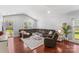 Spacious living room with hardwood floors and large sectional sofa at 3157 Delaware Dr, Denver, NC 28037