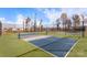 Two pickleball courts with surrounding fence at 7759 Woolsey Dr, Gastonia, NC 28056