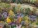 Aerial view of homes nestled amongst autumn trees at 502 Downing Dr, Kings Mountain, NC 28086