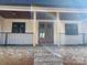 Brick steps leading to front porch with double doors at 615 Sandycrest Dr, Cherryville, NC 28021