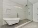 Luxurious bathroom featuring a freestanding tub and walk-in shower at 8508 Tirzah Church Rd, Waxhaw, NC 28173