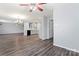 Bright dining room with hardwood floors and kitchen access at 152 Vermillion Loop, Statesville, NC 28625