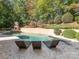 Inviting kidney-shaped pool with lounge chairs and a diving board at 1709 Brookshaw Run, Fort Mill, SC 29715