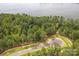 Lakefront lot with wooded area and private access road at 1007 Kingbird Ln, Clover, SC 29710