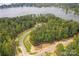 Lakefront lot with wooded area and private access road at 1007 Kingbird Ln, Clover, SC 29710