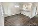 Simple dining area with dark grey flooring and a chandelier at 1831 J Julian Ln # A, Charlotte, NC 28208