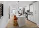 Modern kitchen island with white cabinets and quartz countertops at 409 Blairhill Rd # 14, Charlotte, NC 28217