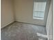 Spacious bedroom with neutral-toned carpet at 177 Rhuidean Ct, Troutman, NC 28166