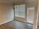 Bright dining area with hardwood floors and access to back patio at 177 Rhuidean Ct, Troutman, NC 28166