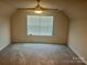 Bright bedroom featuring neutral walls and carpet at 177 Rhuidean Ct, Troutman, NC 28166