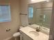 Clean bathroom with a bathtub and a single vanity at 177 Rhuidean Ct, Troutman, NC 28166