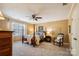 Bright bedroom with a post bed, ceiling fan, and ample closet space at 906 Wentworth Dr, Kannapolis, NC 28081