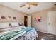 Bedroom with queen bed, ceiling fan and lots of natural light at 906 Wentworth Dr, Kannapolis, NC 28081