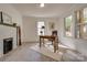 Bright home office features a fireplace, built-in desk, and hardwood floors at 736 Cedar St, Rock Hill, SC 29730