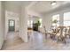 Bright dining area with hardwood floors and view into kitchen at 736 Cedar St, Rock Hill, SC 29730