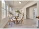 Dining area features a round table with four chairs and hardwood floors at 736 Cedar St, Rock Hill, SC 29730