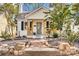 Quaint white cottage with brick path and porch at 736 Cedar St, Rock Hill, SC 29730