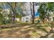 Large backyard with grassy area and mature trees at 736 Cedar St, Rock Hill, SC 29730
