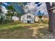 Spacious backyard with grassy area and mature trees at 736 Cedar St, Rock Hill, SC 29730