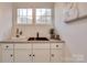 Stylish bar with a sleek black sink and white cabinetry at 736 Cedar St, Rock Hill, SC 29730