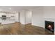 Living room with corner fireplace and hardwood floors at 4012 Parsons Field Ct, Maiden, NC 28650