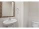 Small bathroom with pedestal sink and toilet at 4012 Parsons Field Ct, Maiden, NC 28650