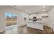 Kitchen with island, stainless steel appliances and sliding glass door to patio at 4012 Parsons Field Ct, Maiden, NC 28650