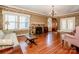 Spacious living room with hardwood floors and fireplace at 223 N Oak St, Statesville, NC 28677