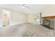 Spacious living room with fireplace and access to other rooms at 1472 Fritts Ave, Fort Mill, SC 29715