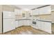 Efficient kitchen with white cabinets and modern appliances at 1472 Fritts Ave, Fort Mill, SC 29715