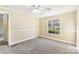 Well-lit bedroom with a window and ceiling fan at 1472 Fritts Ave, Fort Mill, SC 29715