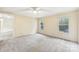 Spacious bedroom with neutral carpeting and ceiling fan at 1472 Fritts Ave, Fort Mill, SC 29715