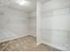 Large walk-in closet with ample shelving and hanging space at 5021 Henshaw Rd, Waxhaw, NC 28173