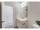 Simple bathroom with vanity and mirror at 5021 Henshaw Rd, Waxhaw, NC 28173