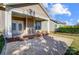 Brick patio with covered porch and double doors at 5021 Henshaw Rd, Waxhaw, NC 28173
