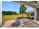 Spacious backyard with patio and partial view of homes at 5021 Henshaw Rd, Waxhaw, NC 28173